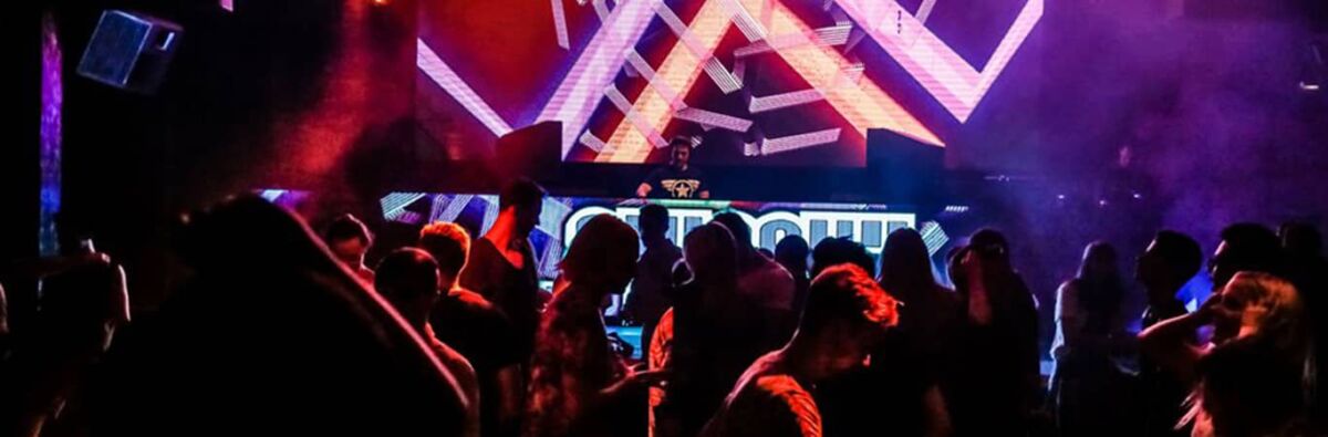 Gay nightclub with DJ and lights