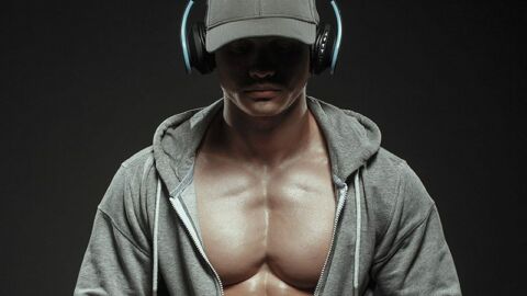 Muscley-man-listening-to-music