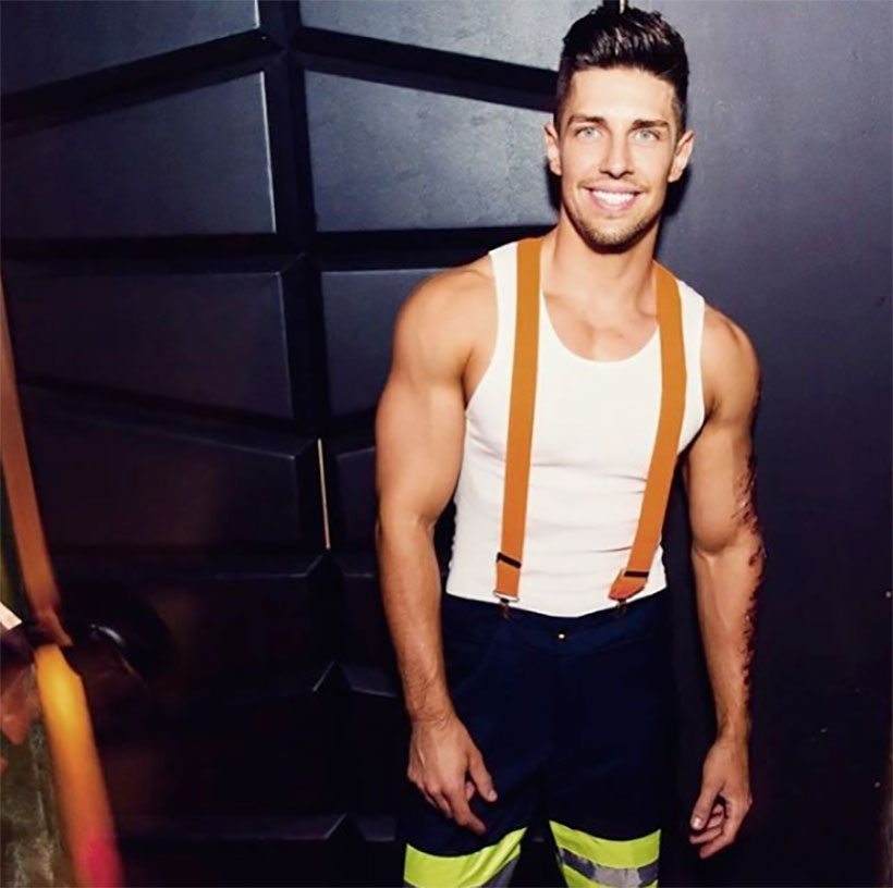 ryan greasley in fireman pants singlet and suspenders