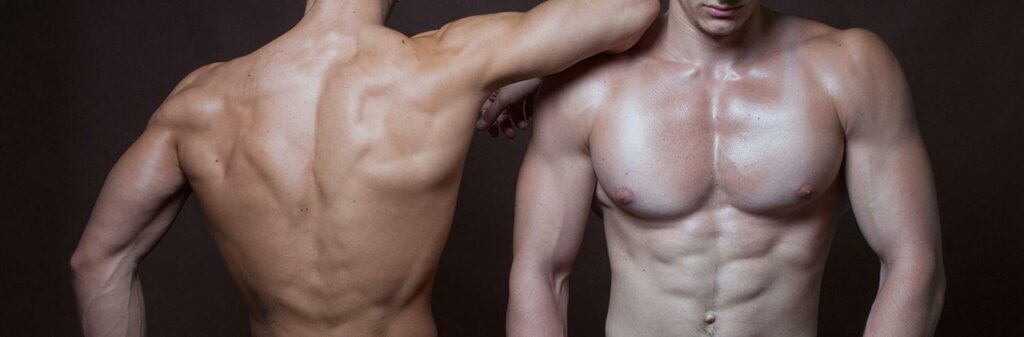 Two men facing away from each other