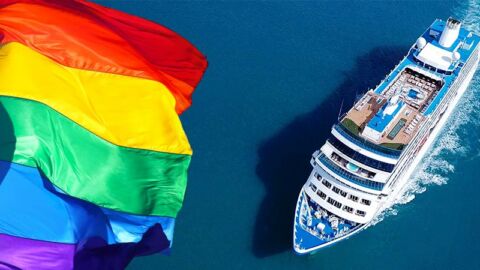 cruise ship sailing with rainbow pride flag