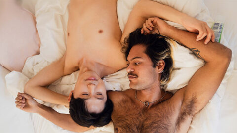 happy-asian-couple-in-bed