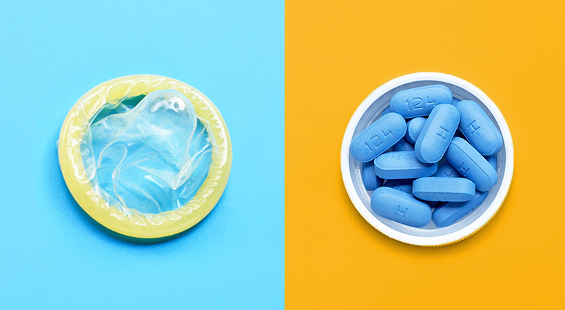 single condom with prep pills in bottle lid centered on blue and yellow backgrounds