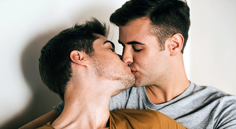 young boyfriends share a sweet kiss