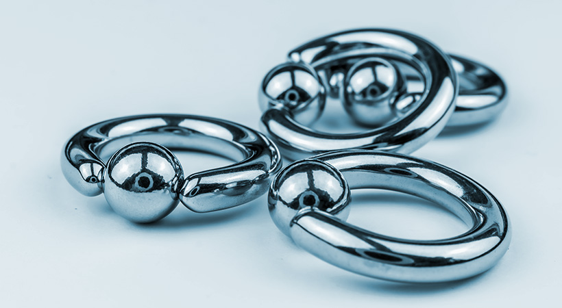 close up on four captive bead piercing rings