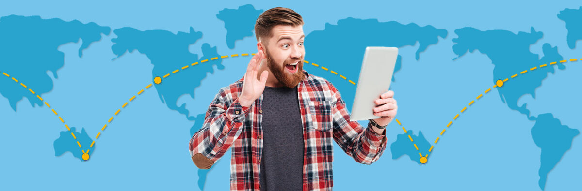 bearded man waves to long distance boyfriend on tablet device