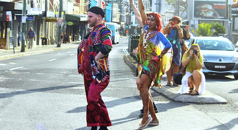 people dancing in street newtown sydney