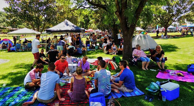 people enjoying a picnic at adelaide feast festival