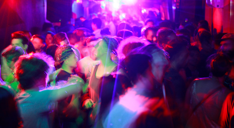 people partying at a queer nightclub