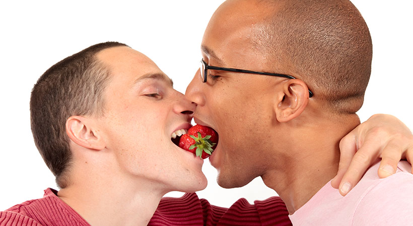 couple-sharing-strawberry