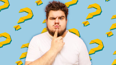 bearded-man-in-white-t-shirt-confused-on-blue-background-with-yellow-question-marks