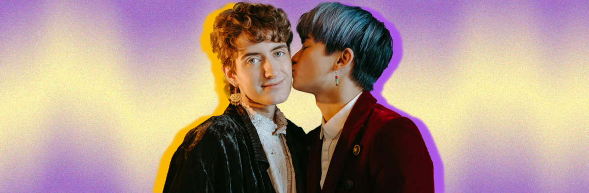 blue-haired-asian-man-kisses-white-non-binary-person-on-cheek-on-purple-and-yellow-background