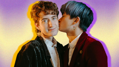 blue-haired-asian-man-kisses-white-non-binary-person-on-cheek-on-purple-and-yellow-background