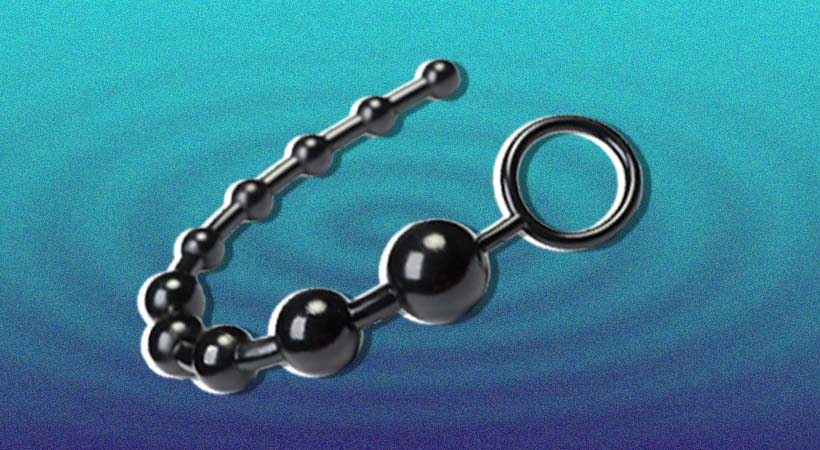 Black anal beal cock ring on blue ripple background