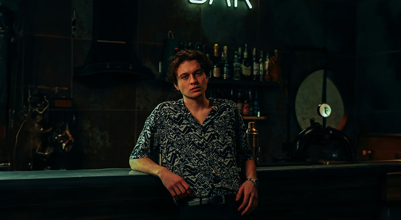 young-white-man-looks-seductive-in-bar