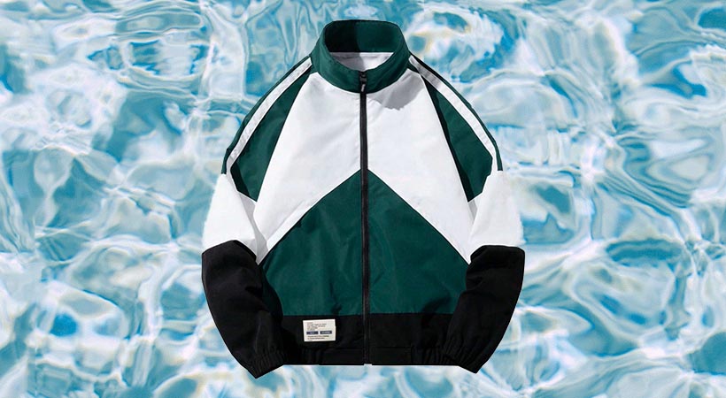 Vintage windbreaker on water background
