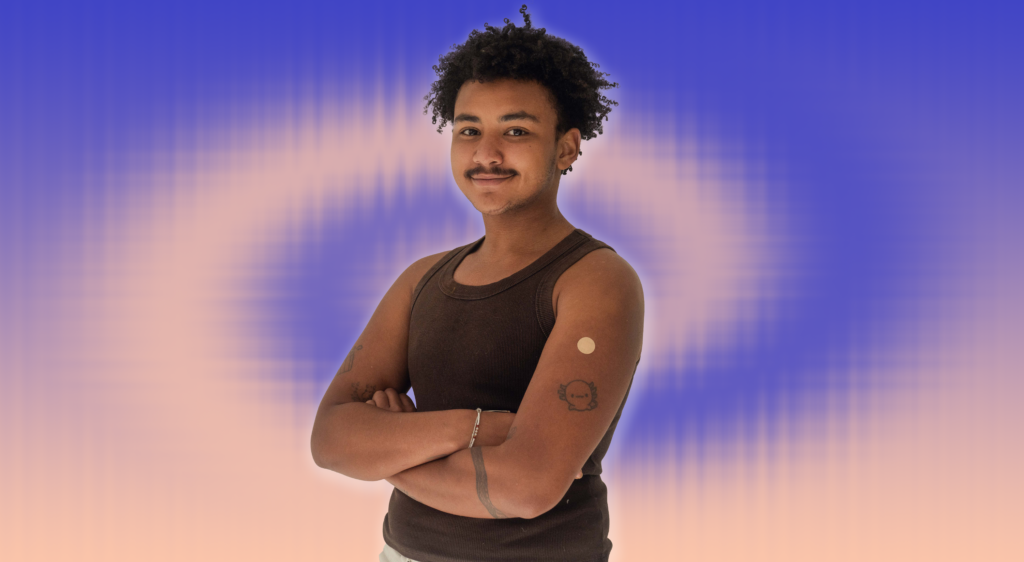 ghanian-trans-man-with-injection-bandaid-on-patterned-background