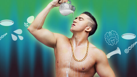 attractive muscular young man taking a bath with milk on green and white button background