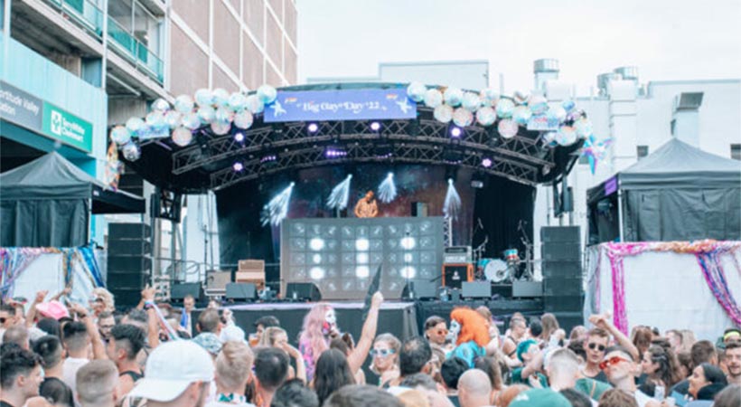 Big Gay Day festival stage filled with people
