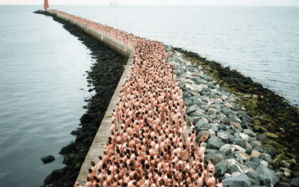 many-naked-people-on-wharf