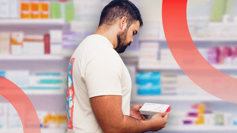venezuelan-man-holding-self-testing-kit-at-pharmacy