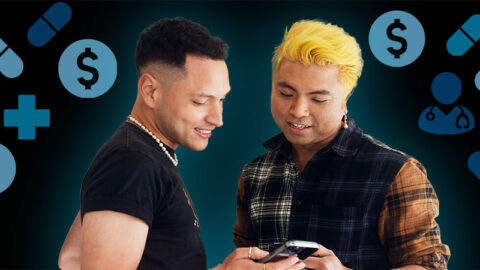 Colombian and vietnamese couple look at phone on black background with blue medical emojis