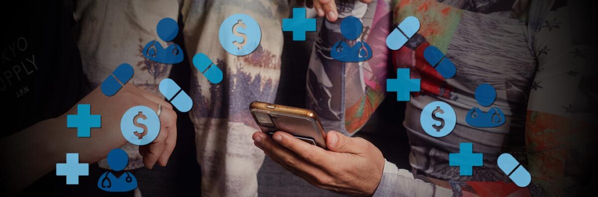 Male hand holding phone, shwoing friends. Blue health emoji in semi-circle