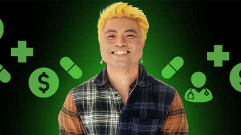 Cambodian Vietnamese man with ywllow hair smiling on black background with green health icons